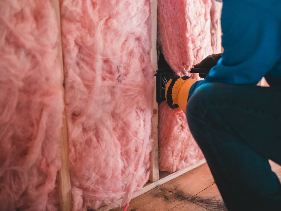 Batt insulation fitted between wall studs