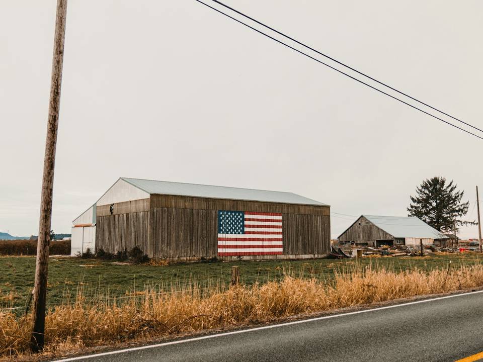 Barn with metal roof on rural land